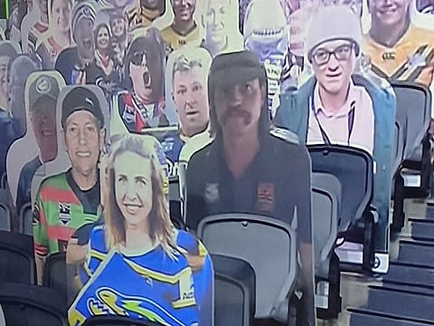 Dominic Cummings, top right, the under-fire political aide to UK Prime Minister Boris Johnson, made an appearance of sorts at an NRL match