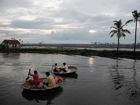 Fishermen row their traditional boats as they set out to fish in the morning in Kochi, Kerala, on Monday, June 1, 2020. The southwest monsoon is likely to hit Kerala on May 27, 2022.