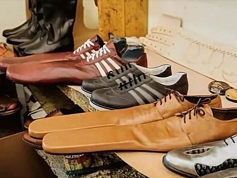 Social distancing social made by a Romanian cobbler