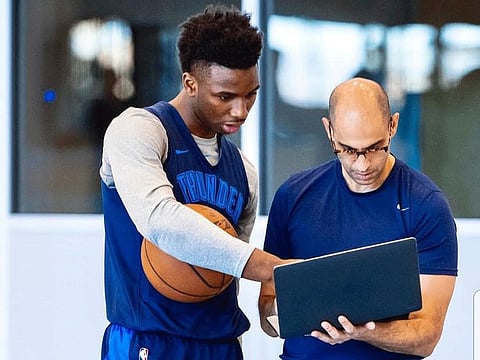 Vin Bhavnani (right) has come up the ranks in the NBA to become the assistant coach of Oklahama City Thunder for the fourth season.