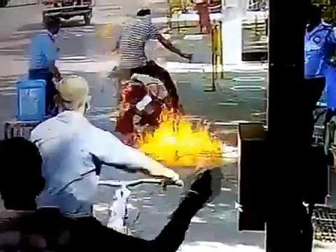 Bike accidentally goes up in flames because of sanitiser at drive-through checkpoint