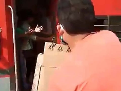 Video surfaced on social media showing biscuits being thrown at migrant workers in India