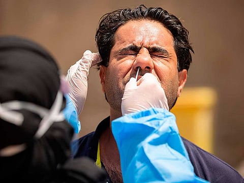 A medical worker takes a swab from a man being tested for coronavirus. Picture for illustrative purposes only.