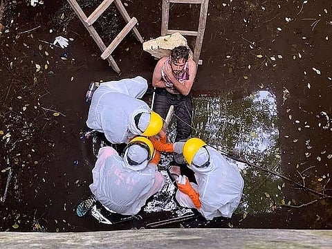 Indonesian Search and Rescue team evacuating British Jacob Matthew Robert