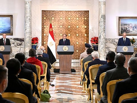 A handout picture released by the Egyptian Presidency on June 6, 2020 shows Egyptian President Abdul Fattah Al Sisi (C), Libyan commander Khalifa Haftar (R) and the Libyan Parliament speaker Aguila Saleh taking part in a joint press conference in the capital Cairo.
