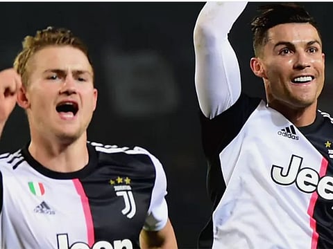 Juve's Matthijs de Ligt and Cristiano Ronaldo