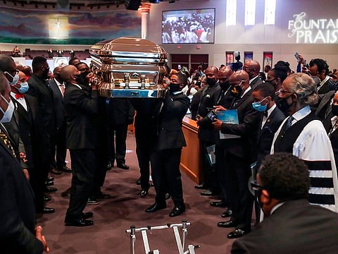 Pallbearers carry the casket of George Floyd following funeral services on Tuesday, June 9, 2020, at The Fountain of Praise church in Houston.