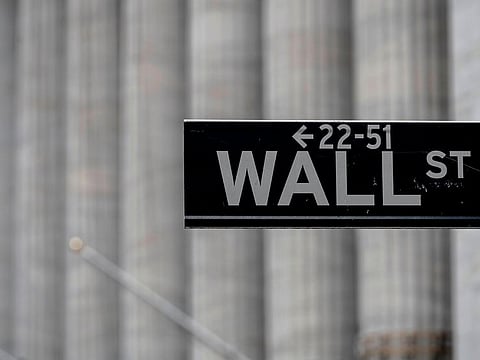 A Wall Street sign near the New York Stock Exchange (NYSE) is seen on May 8, 2020 in New York City.