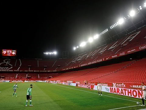 Sevilla's Diego Carlos prepares to take a corner, as play resumes behind closed doors following the outbreak of the coronavirus disease (COVID-19).