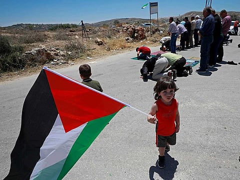 Palestinians protest against Israel's plan to annex parts of the occupied West Bank, in Beta village near Nablus on June 12, 2020.