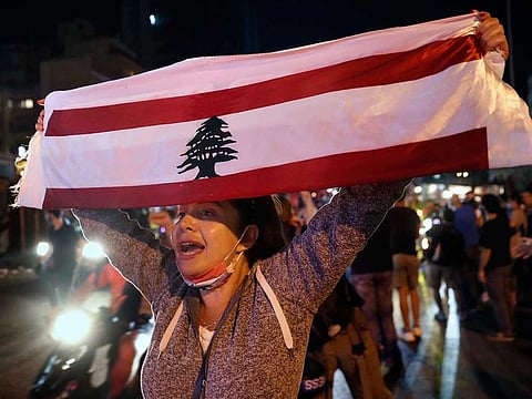 An anti-government protester chants slogans during a rally against the political leadership which is blamed for the economic and financial crisis, in Beirut, Lebanon, on June 11, 2020.