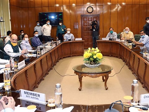 Union Home Minister Amit Shah and Health Minister Dr Harsh Vardhan chair a meeting with Delhi Chief Minister Arvind Kejriwal and LG Anil Baijal along with the members of State Disaster Management Authority to review the situation of COVID-19, in New Delhi on Sunday.