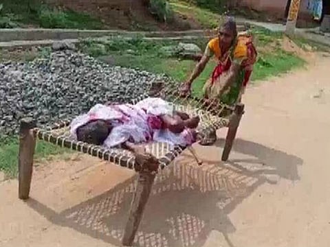 Woman drags mother to the bank