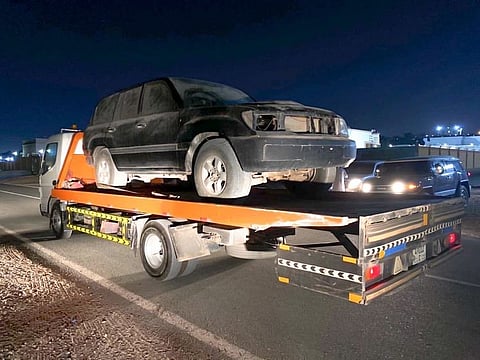 The young man's vehicle is taken away.