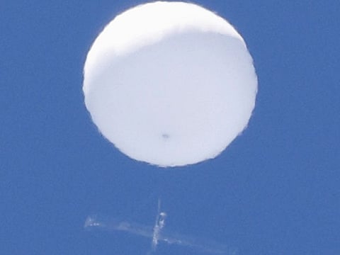 A balloon-like white object in the sky is pictured in Sendai, Japan.