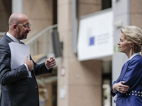 European Council President Charles Michel, left, speaks with European Commission President Ursula von der Leyen after an EU summit, in video conference format, at the European Council in Brussels, Friday, June 19, 2020. As they brace for the worst economic downturn since the Great Depression, leaders of the European Union's member states discussed on Friday the bloc's future long-term budget and a multi-billion post-coronavirus recovery plan. (Olivier Hoslet, Pool Photo via AP)