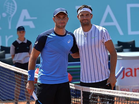 Bulgaria's Grigor Dimitrov, right, with Croatia's Borna Coric during their semifinal match at a tournament in Zadar, Croatia.