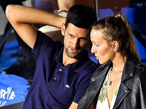 Serbian tennis player Novak Djokovic (L) talks to his wife Jelena during a match at the Adria Tour.