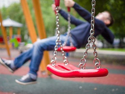 Picture for illustrative purposes: Child playing at a playground