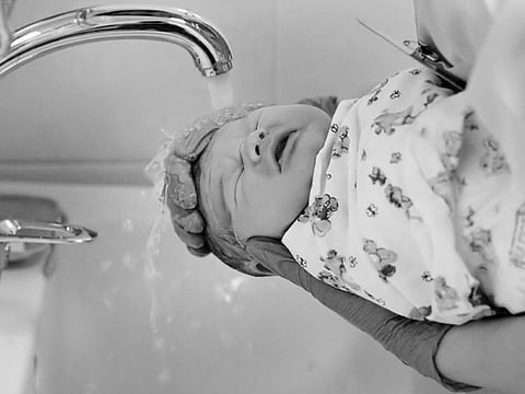 Latest research tells us that washing babies after birth should actually be avoided so as to keep the vernix membrane they are born with intact.