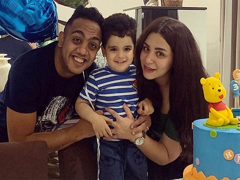 Mohamed ‘Osos’ Usama with his wife and older son Omar.