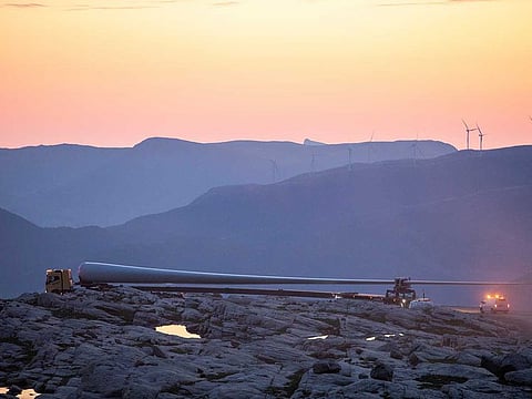 A 70 metre long wing of a wind turbine is seen on its way to the Guleslettene wind park near Floro, Norway June 17, 2020. The Scandinavian country, which was quick to bring the new coronavirus under control, has ignored calls to lift, or at least ease, its travel restrictions.
