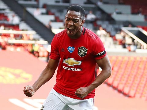 Anthony Martial celebrates his hat-trick for Manchester United against Sheffield United.