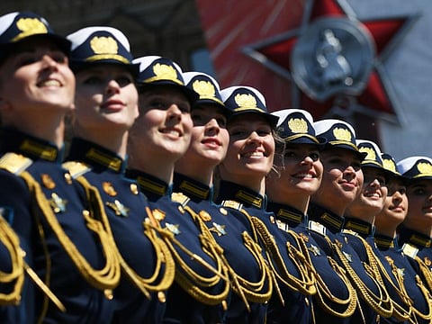 Russian servicewomen march during the Victory Day Parade in Red Square in Moscow, Russia, June 24, 2020. The military parade, marking the 75th anniversary of the victory over Nazi Germany in World War Two, was scheduled for May 9 but postponed due to the outbreak of the coronavirus disease (COVID-19).