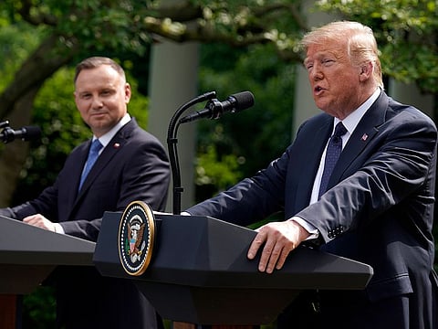 US President Donald Trump speaks during a news conference with Polish President Andrzej Duda in the Rose Garden of the White House, Wednesday, June 24, 2020, in Washington.