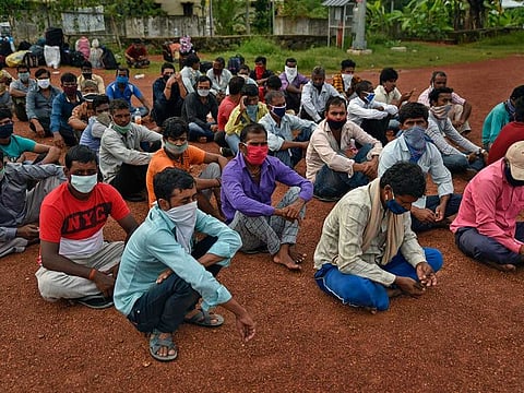 Migrant workers from Bihar state wait for buses to catch home bound train in Kochi in a file picture. The top court directed the government to develop the portal in consultation with National Informatics Centre (NIC) for registration of the unorganised labourers/migrant workers.