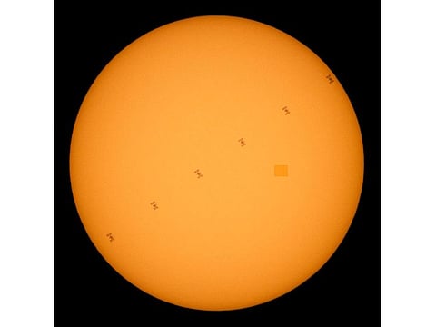 This NASA composite image, made from six frames, shows the International Space Station, with a crew of five onboard, in silhouette as it transits the Sun at roughly five miles per second, on June 24, 2020, from Fredericksburg, Virginia.