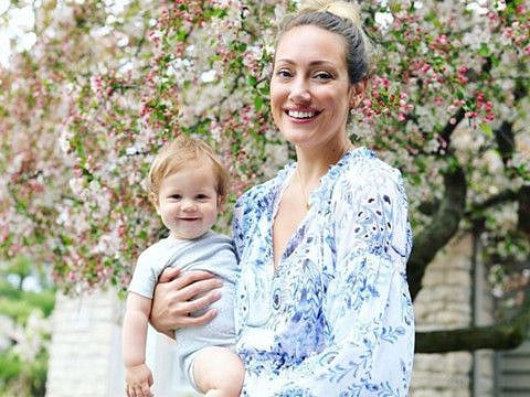 Myka Stauffer with one of her biological children.
