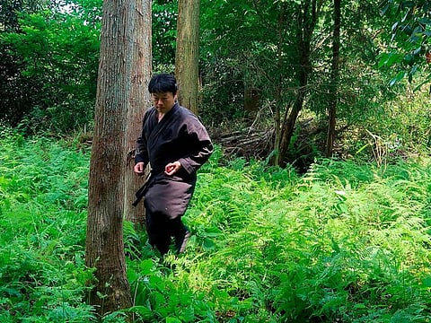 Genichi Mitsuhashi has become the first student ever to graduate from a Japanese university with a master's degree in ninja studies.