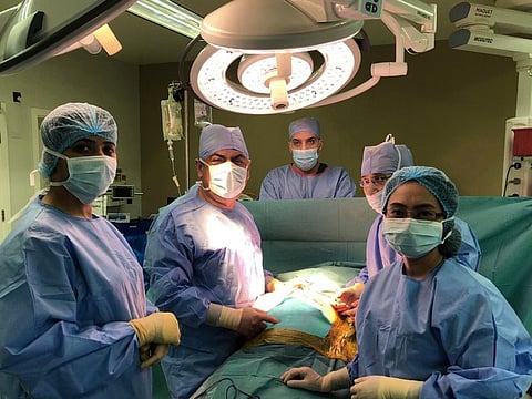 Dr Farouk Safi and the team at Saudi German Hospital Dubai performing a complex surgery