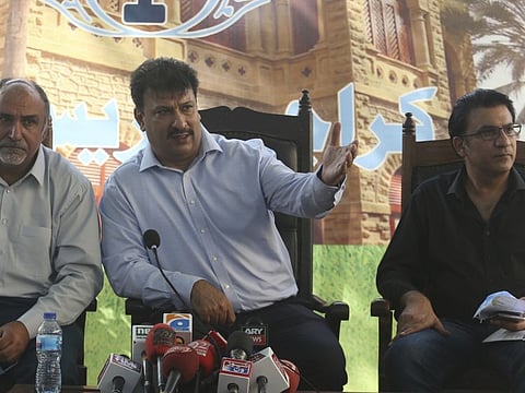 Captain Chaudhry Salman, centre, President of Pakistan Airlines Pilots' Association addresses a news conference with others in Karachi on June 27.
