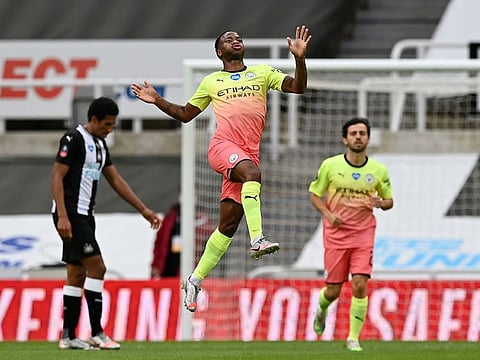 Manchester City's Raheem Sterling celebrates scoring against Newcastle.