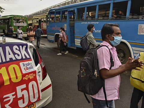 A banner displaying masks for sale on a car owned by a cab driver who has been out of work due to the COVID-19 and is now selling face masks in Kochi, Kerala on July 2, 2020.