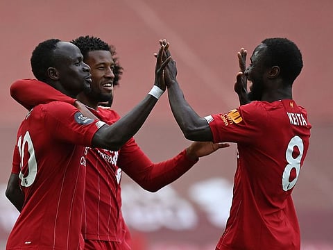 Liverpool's Sadio Mane celebrates scoring his team's first goal against Aston Villa