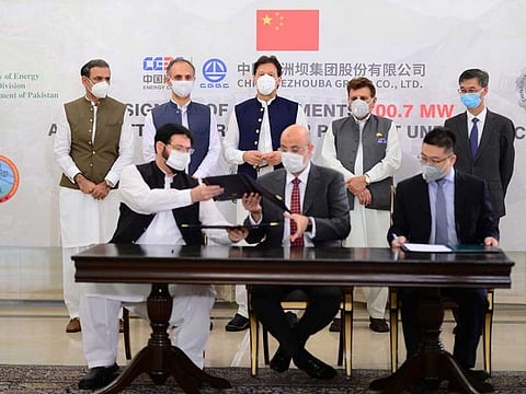 PM Imran Khan witnessing the signing of agreement for Azad Pattan Hydel Power Project on July 6.