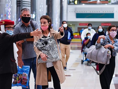 Passengers arriving at Terminal 3, Dubai International Airport, on Wednesday as Dubai reopens to tourists