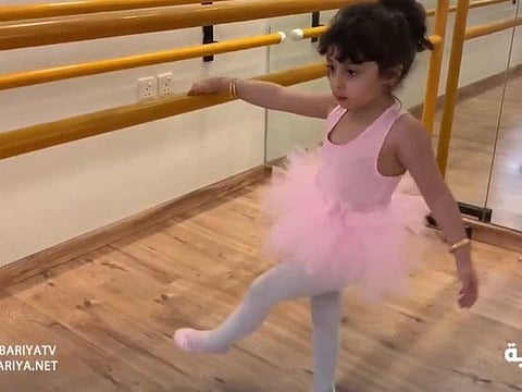 A child practices ballet at a coaching institute in the Saudi Eastern region