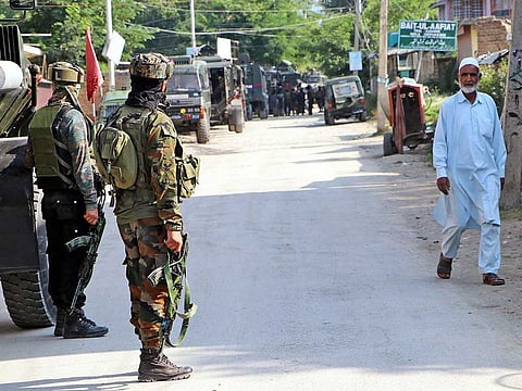 Indian Army personnel cordon off an area during a terrorist attack in Sopore, Kashmir, on July 8 Wednesday.