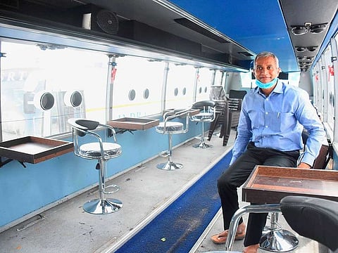 Andhra Pradesh Transport Commissioner Madireddy Pratap during an inspection of 'Sanjeevani buses', to be used for COVID-19 testing, in Vijayawada, Monday, July 13, 2020.