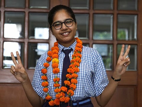 Divyanshi Jain, the class 12 student of the Arts stream who topped the CBSE Board examinations by scoring 600 out of 600 to get 100%, in Lucknow on July 13, 2020.