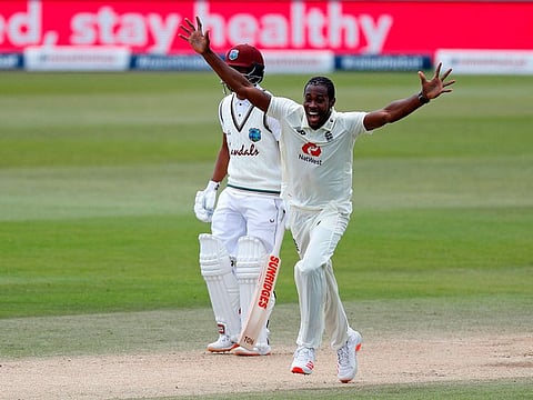 England's Jofra Archer celebrates after trapping West Indies' Shamarh Brooks leg before wicket.