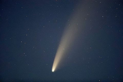 The comet Neowise or C/2020 F3 is seen over the Turets, Belarus, 110 kilometers (69 miles) west of capital Minsk, early Tuesday, July 14, 2020. (AP Photo/Sergei Grits)