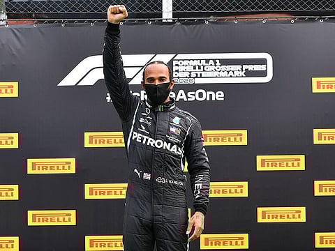 Lewis Hamilton on the podium after winning the Styrian Grand Prix