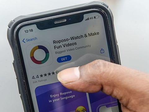 A man browses on an online store the Indian app platform Roposo in Chennai. Millions have joined homegrown social media platforms after India banned 59 Chinese apps, including TikTok, amidst a growing showdown between the neighbours.