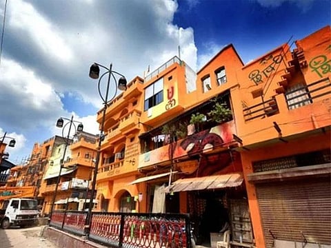 India: Houses on an entire block painted saffron, in UP