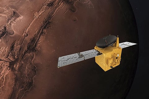 This June 1, 2020, rendering provided by Mohammed Bin Rashid Space Centre shows the Hope Probe in Mars' orbit.